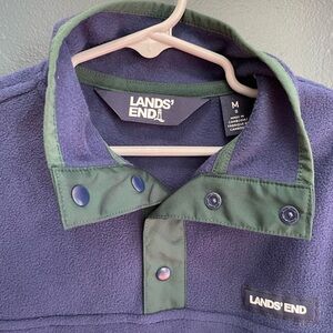 Lands End
MEDIUM
Blue/green fleece pullover 
NWOT